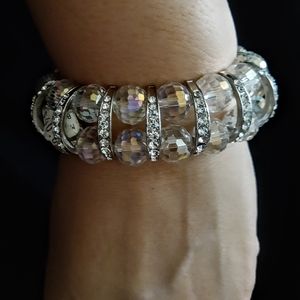 TWO ELASTIC  BRACELETS MADE WITH CRYSTAL BEADS.